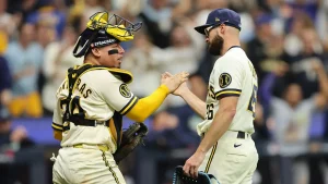 Brewers finish dramatic comeback in Game 2 after disputed decision gives them a 2-0 lead in World Series against Rays