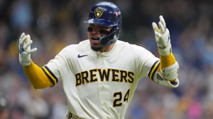 Brewers win Game 1 of NLDS following a disputed decision on a clear home run that struck the stadium roof.