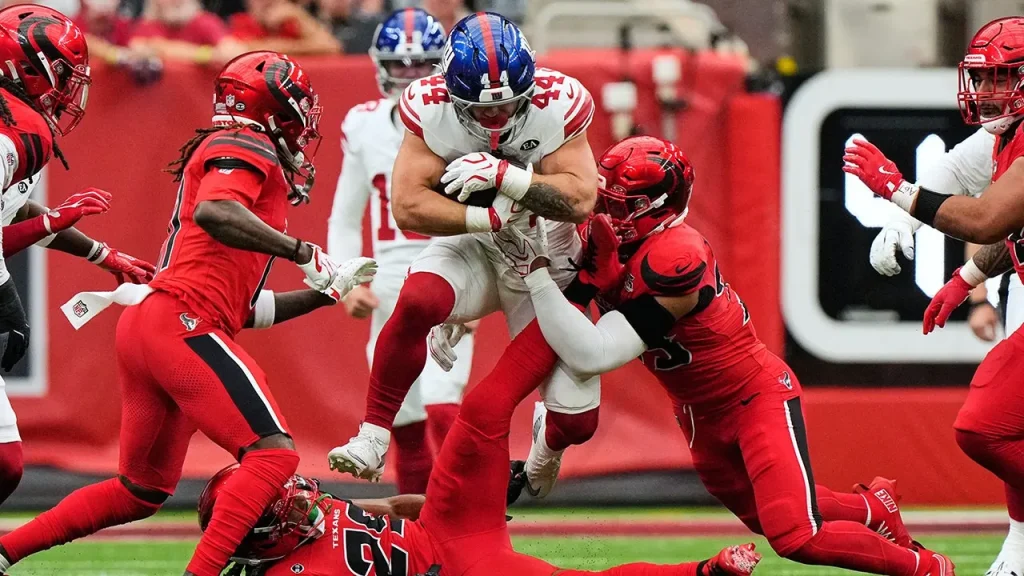 Cam Skattebo of the Giants penalized for hitting Texans defender hard during normal play