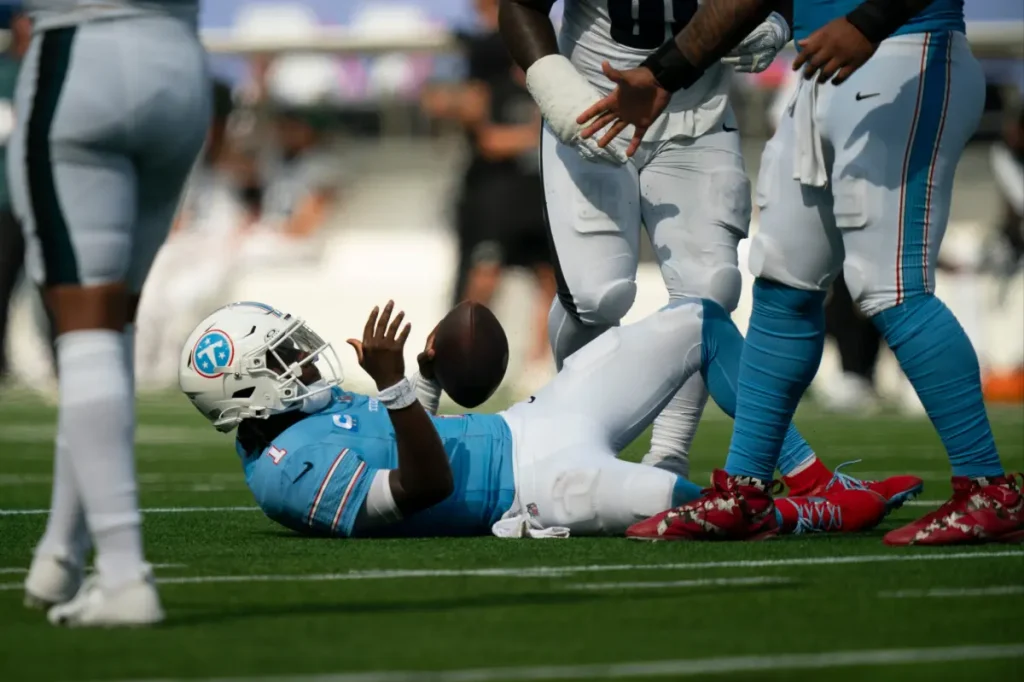 Cam Ward criticizes threats directed at his family following the Titans' unsuccessful start.