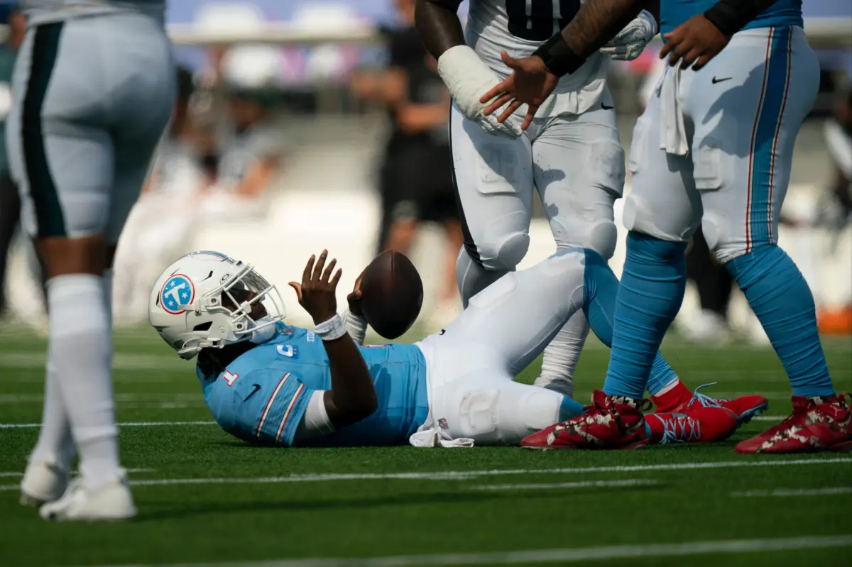 Cam Ward criticizes threats directed at his family following the Titans' unsuccessful start.