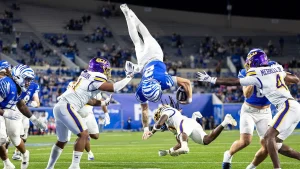 College football team attracts surprisingly few fans for what becomes an exciting Thursday night game
