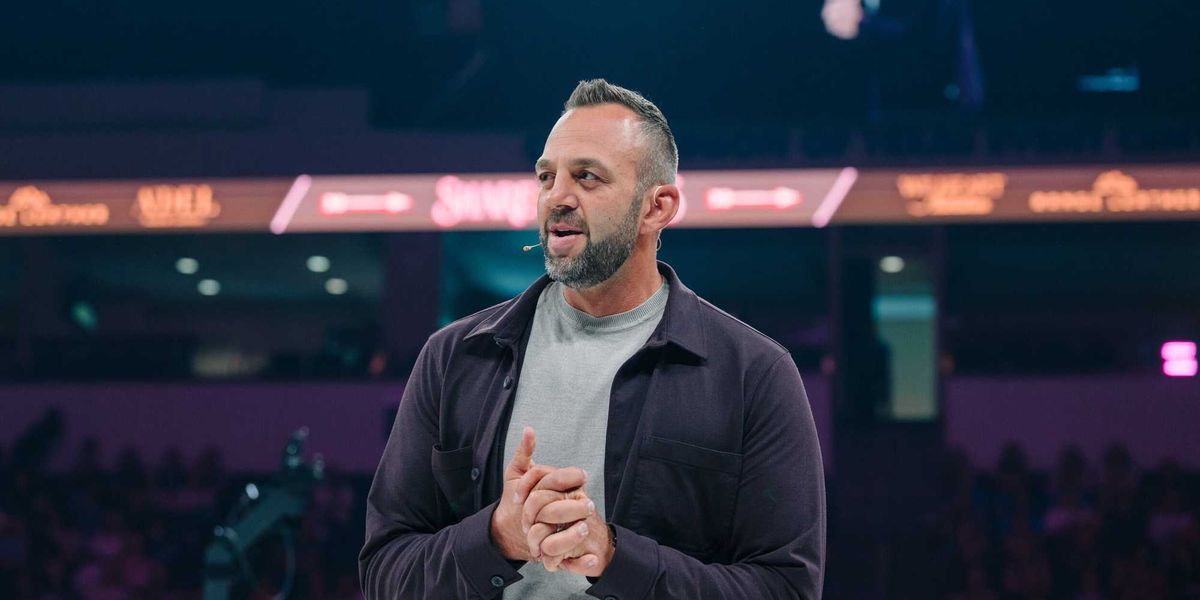 Costi Hinn achieves a milestone at Share the Arrows, encourages wives to be 'crowns'