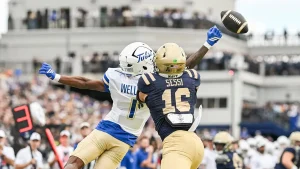 David Wells Jr. from Tulsa catches his own tipped ball for an unlikely touchdown in a crazy play against Navy
