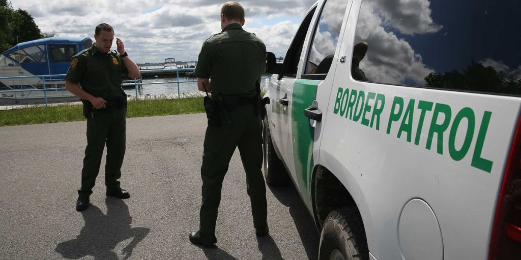 Demonstrators assist 2 migrants in fleeing from Border Patrol after a lengthy standoff atop a roof in New York