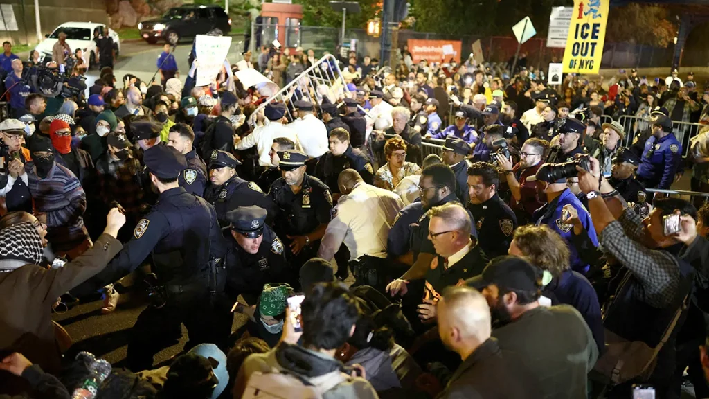 Demonstrators conflict with police following a shooting involving ICE in the Bronx
