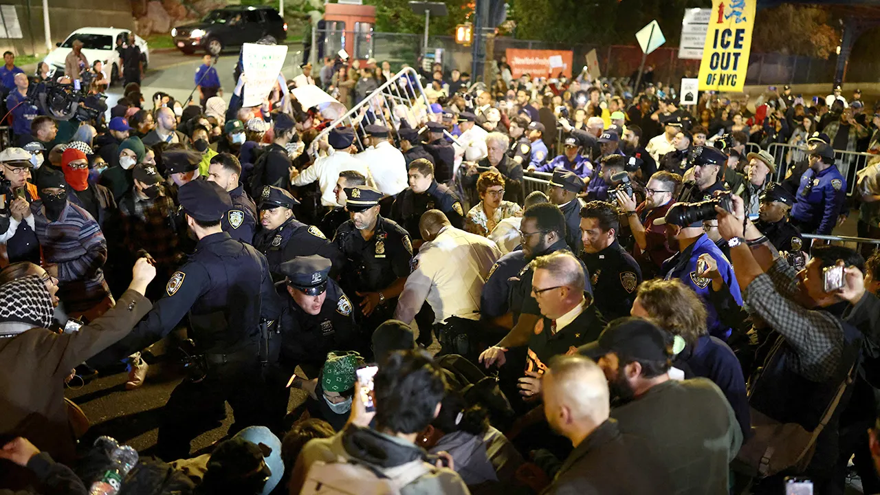 Demonstrators conflict with police following a shooting involving ICE in the Bronx