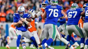 Denver Broncos overcome a rough offensive performance to defeat Seattle Seahawks 17-14 in overtime