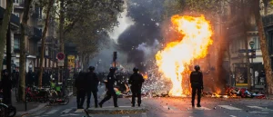 Europe's riots take a disturbing turn as police look into arson and reports of armed rioters emerge.