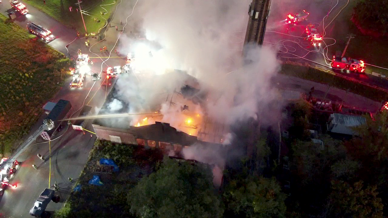 Firefighters in New York City rescue famous church from fire driven by strong winds