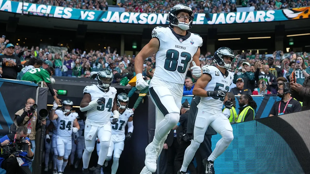 Fireworks begin in London as the NFL season's opening kickoff return touchdown is called back and two players are thrown out.