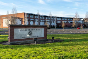 High school girls in cross-country leave track meet in protest of male runner.