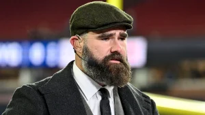 Jason Kelce refers to the Commanders as the 'Redskins' during the game and quickly apologizes to avoid backlash.