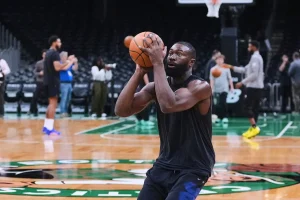 Jayson Tatum and Jaylen Brown overlook one another during Brown's return to Boston