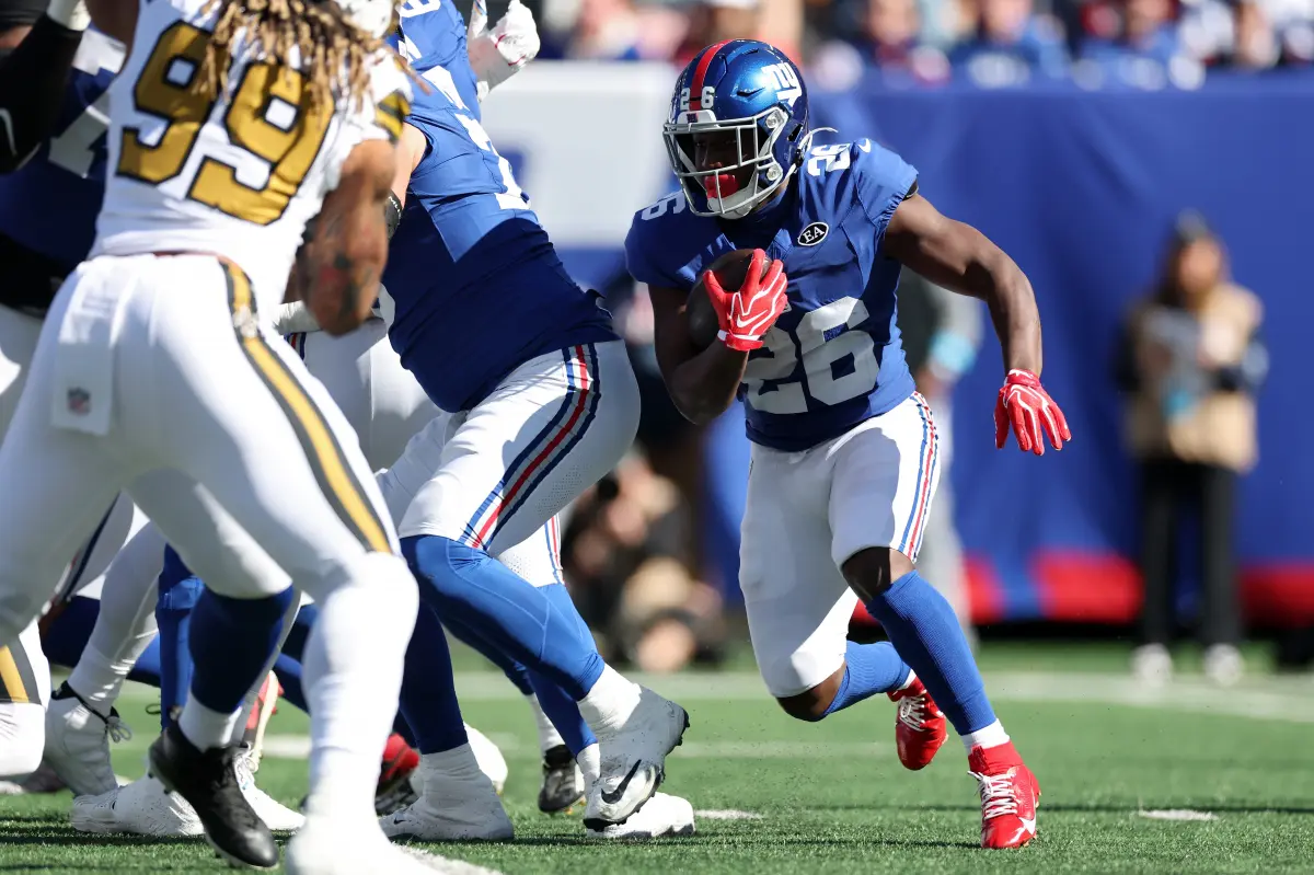 John Harbaugh is anticipating the situation with Saquon Barkley in the Giants' running back group.
