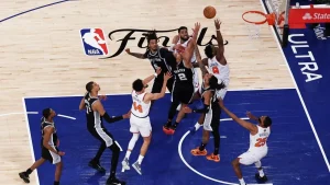 Knicks supporter imitates OG Anunoby's famous Game 4 tip-in using skeletons in a classic Halloween display