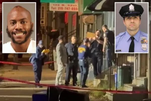 Man accused in fatal attack on Philadelphia police faces 76 charges, held without bail