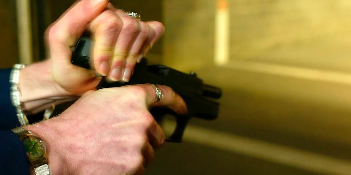 Man assaults elderly woman feeding stray cats at night, but she stands her ground.