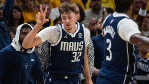 Mavericks player Cooper Flagg leaves the game following a tough foul that leads to a scuffle against the Pacers.