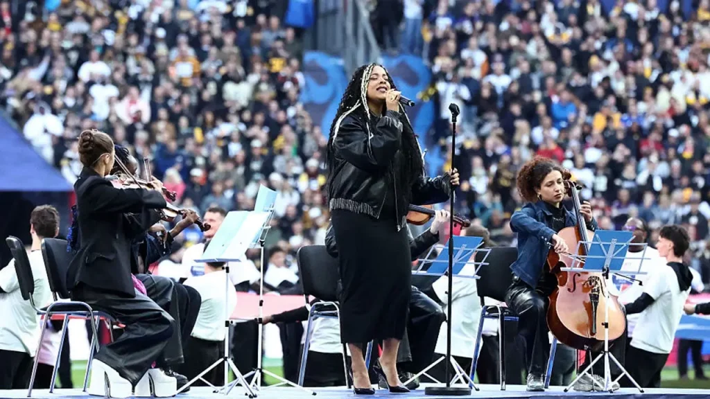 Nina Tonji, who sang the French national anthem at an NFL event, changes the lyrics of La Marseillaise, causing anger in France.