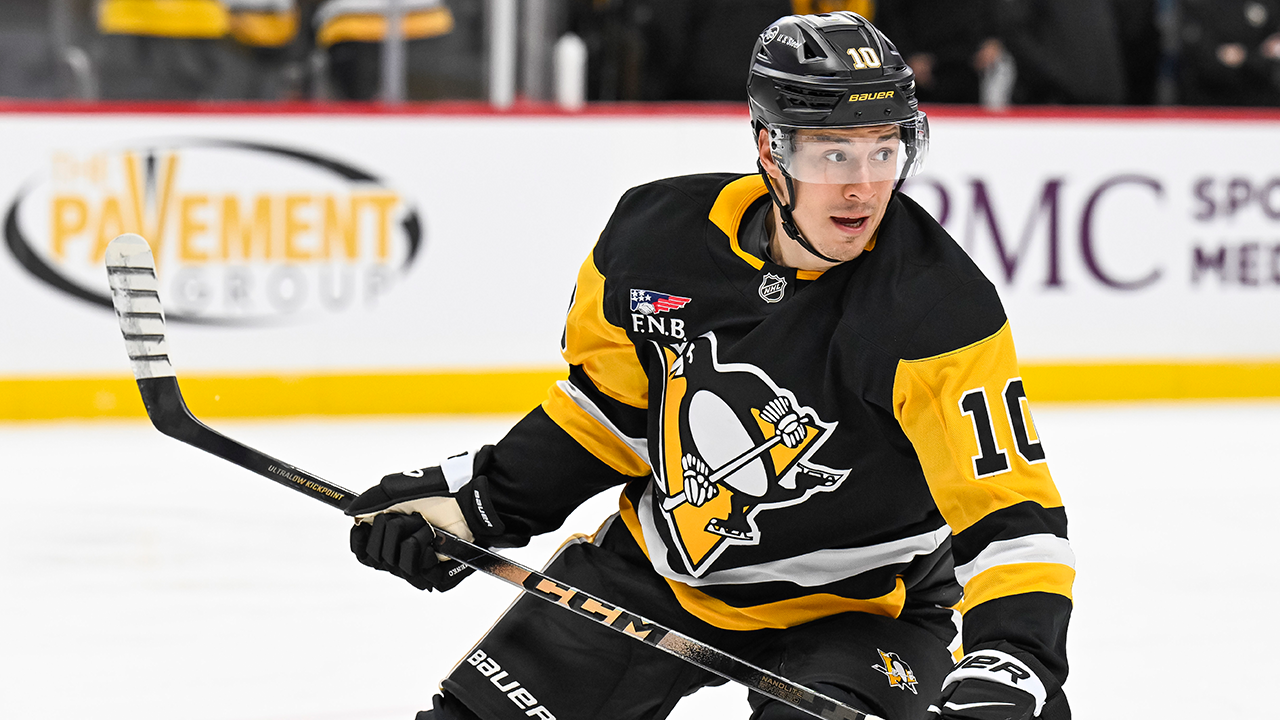 Penguins player Andrei Kuzmenko switches jersey to pay tribute to his father who died in a bear attack.