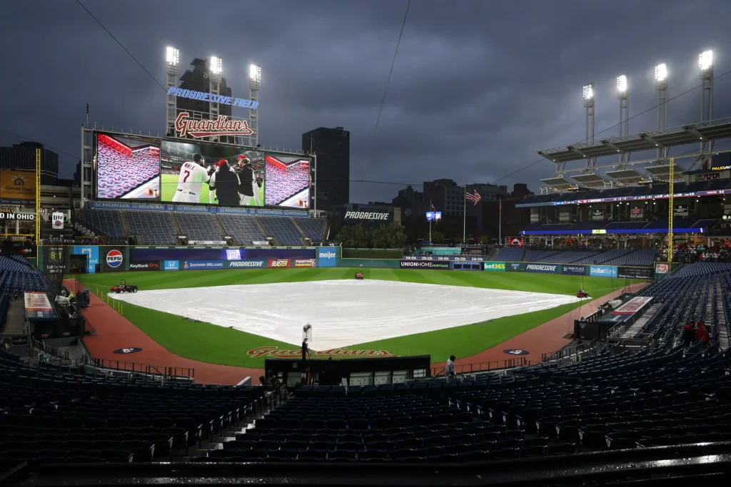 Rain leads to the postponement of the Guardians-Rays ALCS Game 4 in Cleveland.
