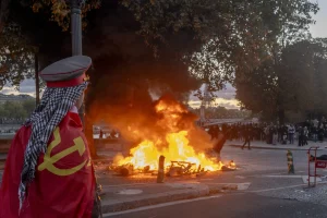 Riots in France lead Macron to initiate security assessment following theft incidents