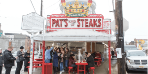 Sandwich throw! Hooded individual recorded tossing a cheesesteak at the manager of a well-known Philadelphia eatery. Big mistake.