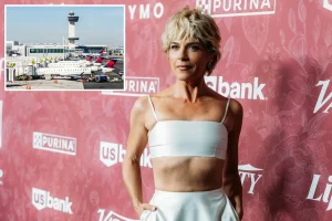 Selma Blair taken into custody for reportedly hitting one flight attendant and biting another on a flight to New York City; FBI is looking into it.