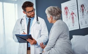 She is visiting a foot doctor for a bunion, and Medicare can cover the appointment while paying nothing for the toenail trim during the same visit.
