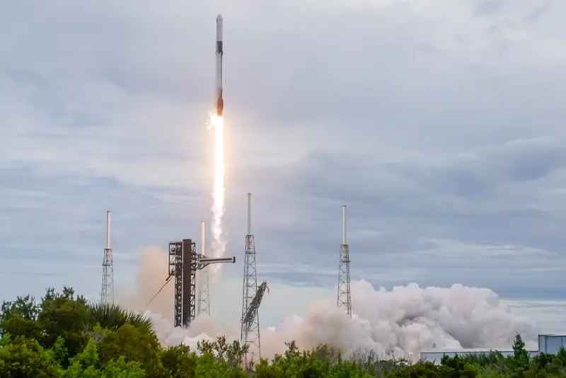 SpaceX announces a profit, and Elon Musk suggests a potential merger with Tesla