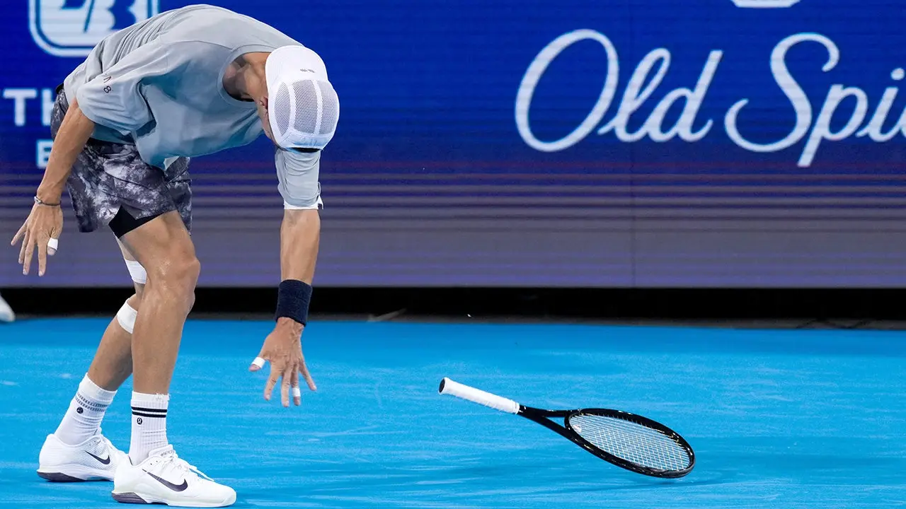 Tennis player Terence Atmane throws racket into the crowd, just missing spectators during a major outburst.