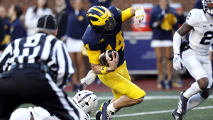 Tommy Carr's impressive performance in the second half helps Michigan secure an essential victory against Penn State.