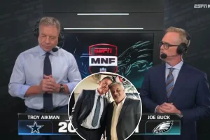 Troy Aikman and Joe Buck share a heartfelt moment in the 'MNF' booth following David Moulton's passing.