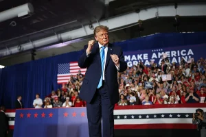 Trump visits Nebraska to lead campaign rally at state fairgrounds as early voting for midterms starts