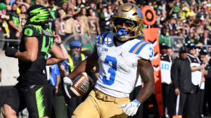 UCLA Bruins surprise Oregon Ducks to remain undefeated and alter the Big Ten championship landscape.
