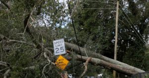 Video shows man mourning wife who died when a tree struck their home during a hurricane.