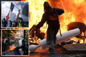 Violence breaks out as 550,000 people flood the streets of France in protest against Macron.