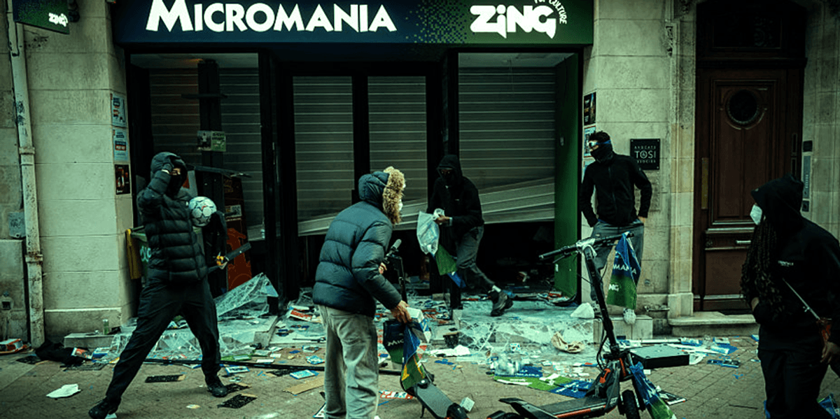 Worker at GameStop in France gains attention for brave stand against violent rioters